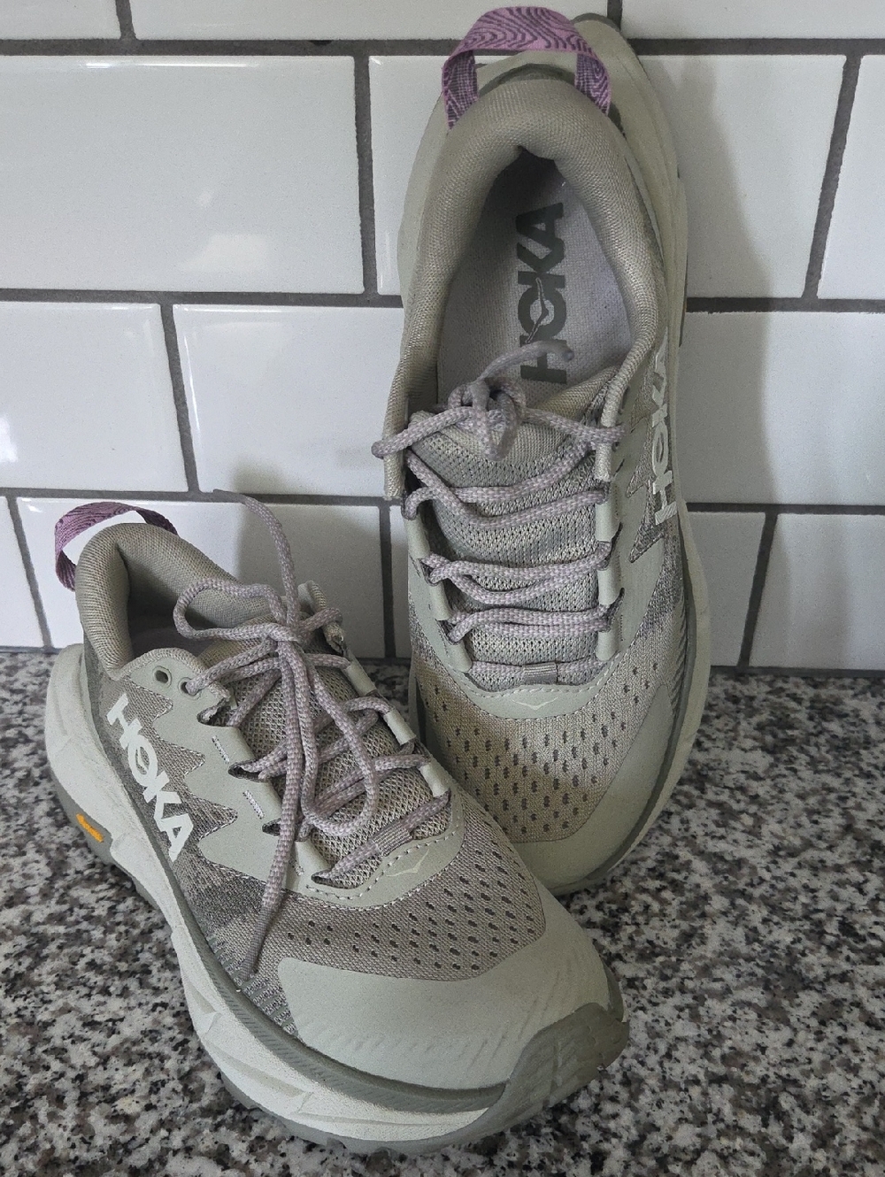 Hoka Women's Skyline Float X Trail Sneakers in Light Olive with Purple Accents